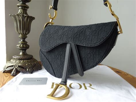 is dior oblique jacquard durable|Dior oblique saddle clutch.